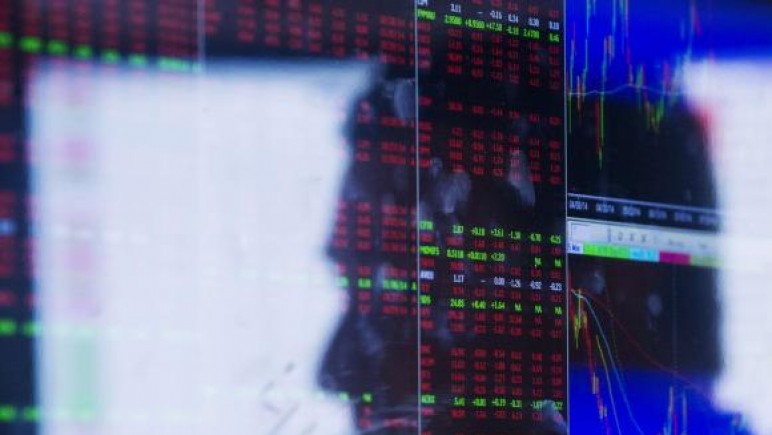 Wall St. ends down on Hong Kong tensions, Ford outlook