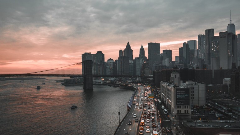 BIRDS EYE VIEW OF CITY DURING DAWN