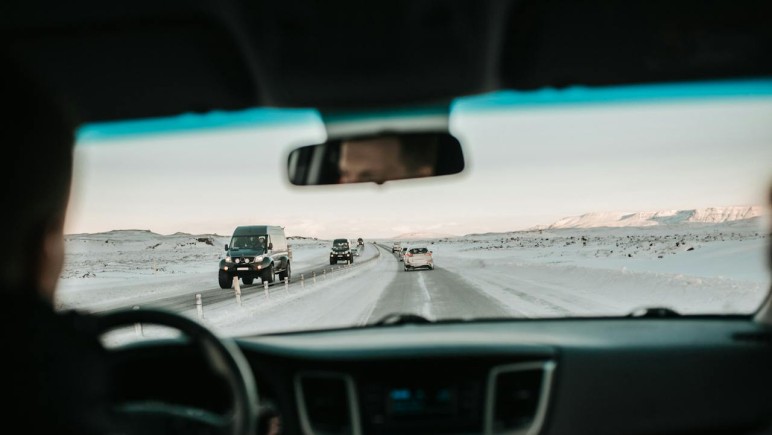 CARS ON SNOWY ROAD