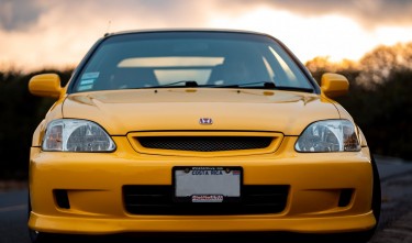 YELLOW HONDA CAR DURING SUNSET