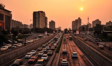 VEHICLE IN ROAD AT GOLDEN HOUR 