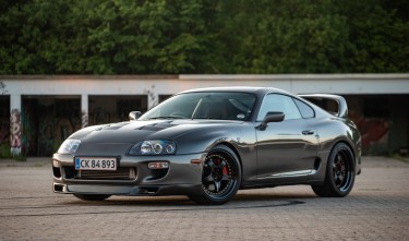 A BLACK TOYOTA SUPRA