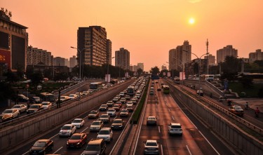 VEHICLE IN ROAD AT GOLDEN HOUR