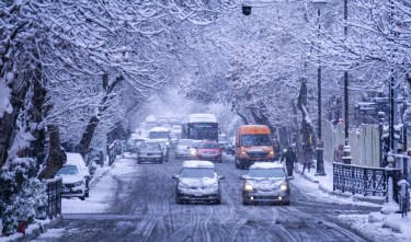 CARS ON A ROAD IN WINTER