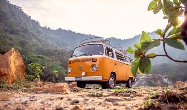 PHOTO OF YELLOW VAN DURING DAYTIME VOLKSWAGEN