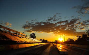 BLACK TOP ROAD DURING SUNSET