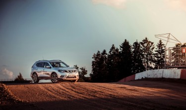 GREY SPORT UTILITY VEHICLE NISSAN