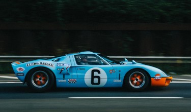 CLASSIC FORD GT40 MK III RACING CAR SPEEDING DOWN THE ROAD 