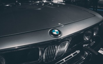 GRAYSCALE PHOTOGRAPHY OF BMW CAR