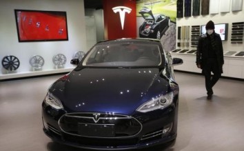 Tesla says in talks with BMW over car batteries, parts