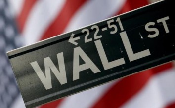 Wall Street flat, near records after tepid data