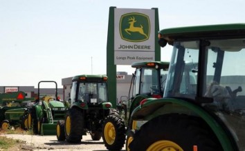 Deere says equipment sales to fall further as farm incomes drop