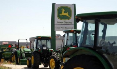 Deere says equipment sales to fall further as farm incomes drop