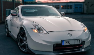 WHITE NISSAN CAR