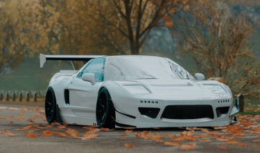 WHITE CAR ON THE ROAD