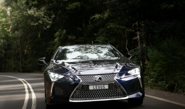 LEXUS CAR DRIVING ON FOREST ROAD 