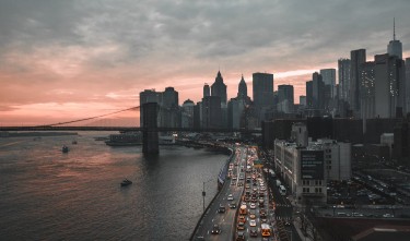 BIRDS EYE VIEW OF CITY DURING DAWN 