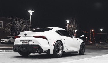 PHOTO OF PARKED WHITE TOYOTA SUPRA