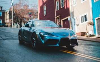 BLACK TOYOTA PARKED ON STREET 