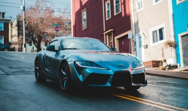 BLACK TOYOTA PARKED ON STREET 