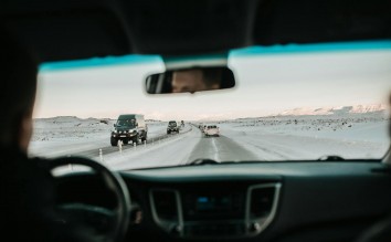 CARS ON SNOWY ROAD