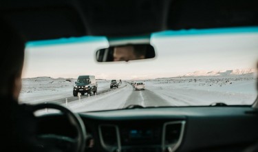 CARS ON SNOWY ROAD