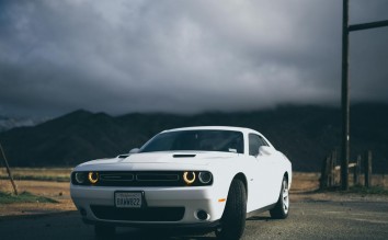  WHITE DODGE  CHARGER ON THE ROAD 