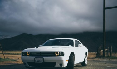  WHITE DODGE  CHARGER ON THE ROAD 