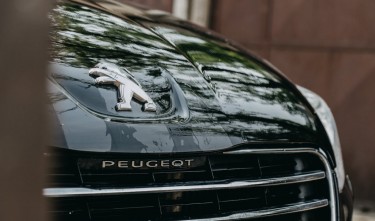 PHOTO OF BLACK PEUGEOT CAR