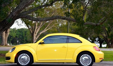 VOLKSWAGEN YELLOW CAR PARK TREES GREEN 