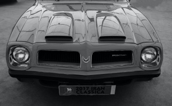 GRAYSCALE PHOTO OF A CLASSIC CAR PONTIAC