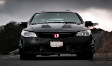 A BLACK HONDA CIVIC CAR