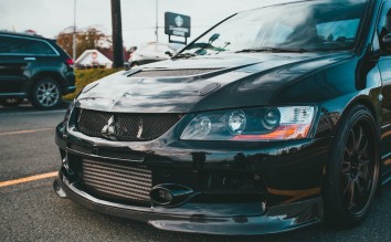 A SELECTIVE FOCUS ON FRONT VIEW OF A SPORT CAR MISTUBISHI 