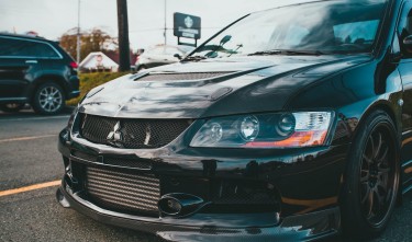 A SELECTIVE FOCUS ON FRONT VIEW OF A SPORT CAR MISTUBISHI 